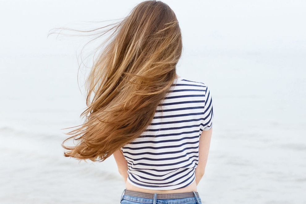 9 Probleme, die Frauen mit langen Haaren das Leben schwer machen